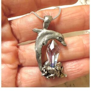 Silver tone crystal dolphin pendant necklace